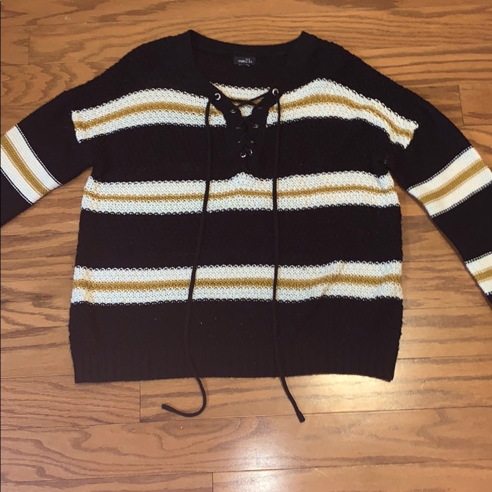 Black sweater with white and yellow stripes